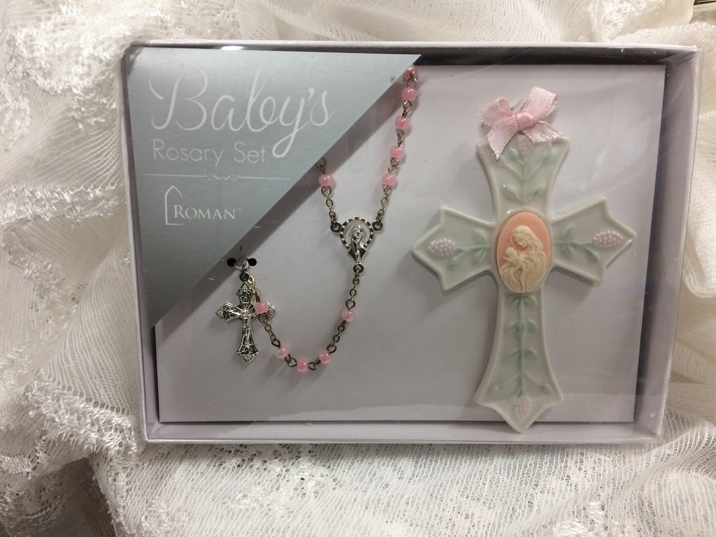Baby girl rosary and cross set.