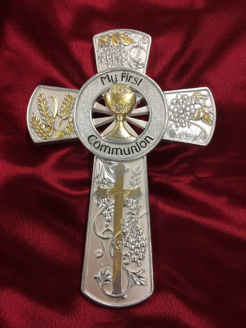 Silver and gold My First Communion cross.