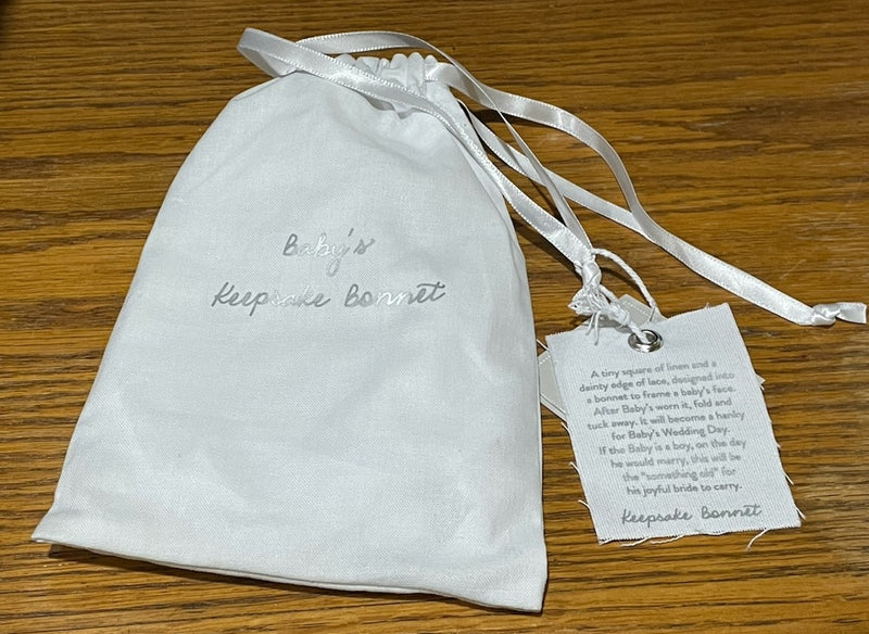 BABY BONNET CROSS SCALLOP EDGE