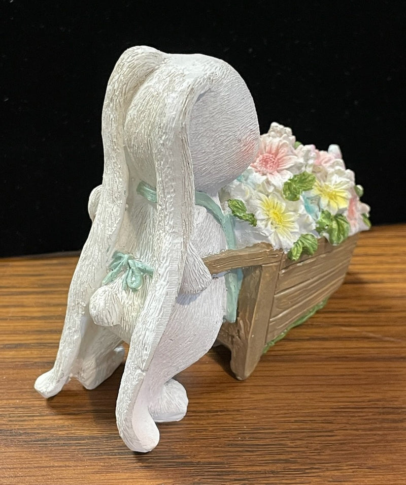 BUNNY WITH BLOOMS STATUE BLUE