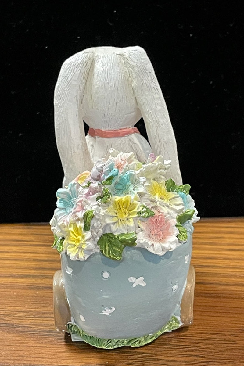 BUNNY WITH BLOOMS STATUE PINK
