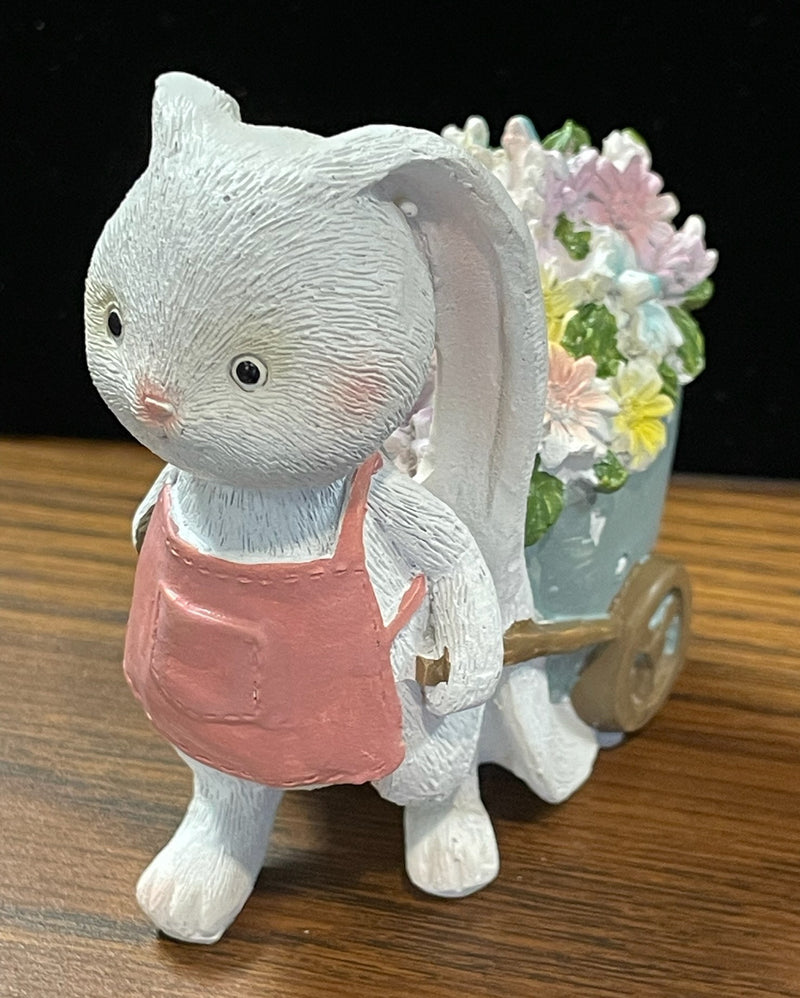 BUNNY WITH BLOOMS STATUE PINK